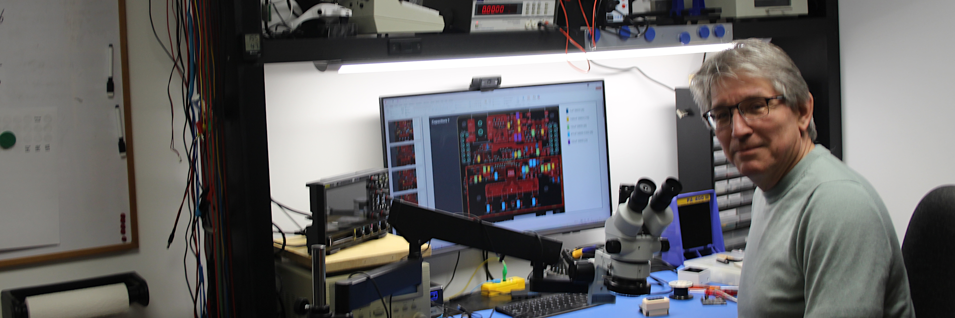 Marc at electronics work bench